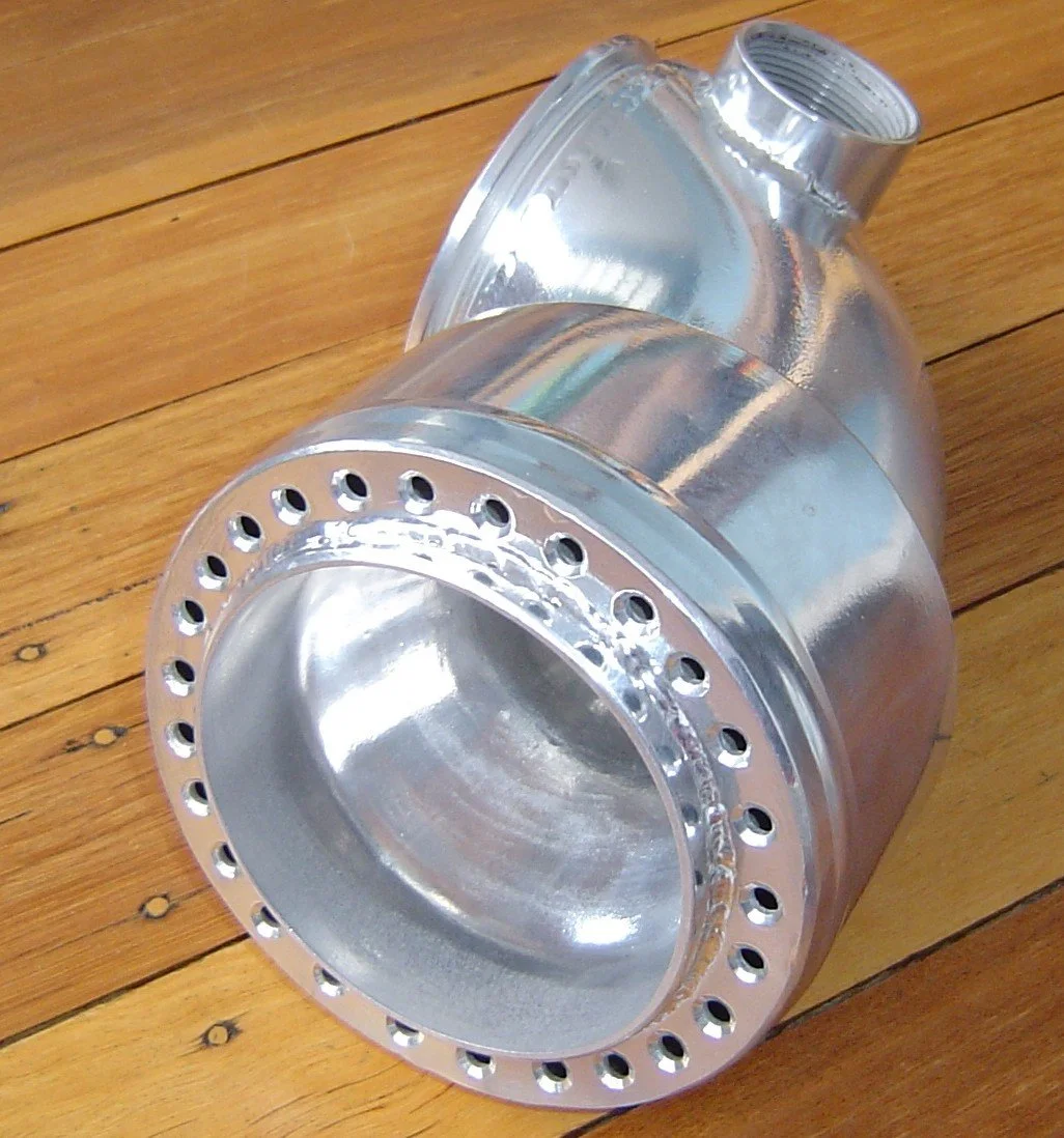Marine stainless steel exhaust fabrication manufactured to suit custom layouts.