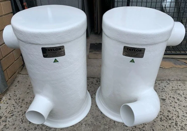 Twin system manufactured in premium vinyl ester composite for a commercial marine application requiring matched exhaust system components.