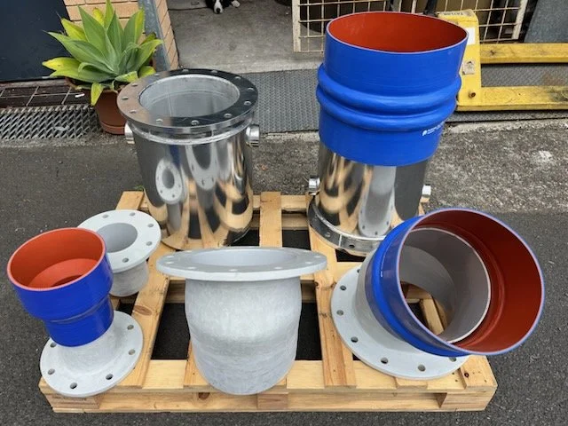 Marine exhaust accessories including silicone hose, tubing and vinyl ester components.