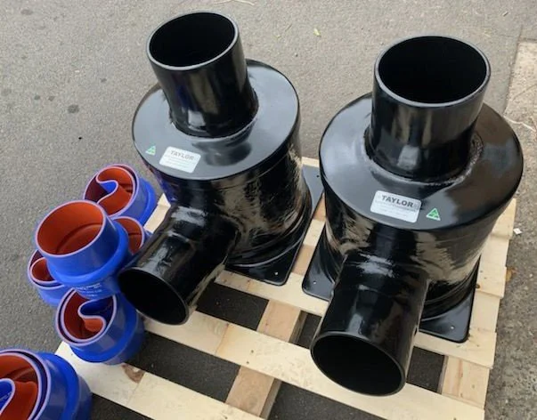 Heavy-duty vinyl ester water lift mufflers and exhaust components manufactured for a vessel-specific wet exhaust system.