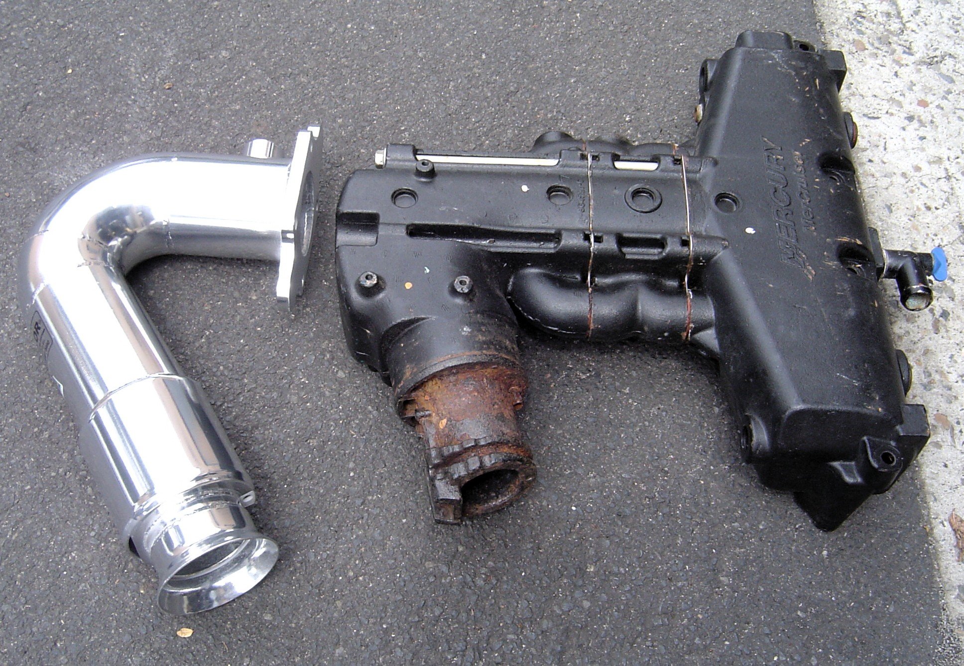 Custom stainless steel exhaust fabrication engineered to suit vessel installation constraints.