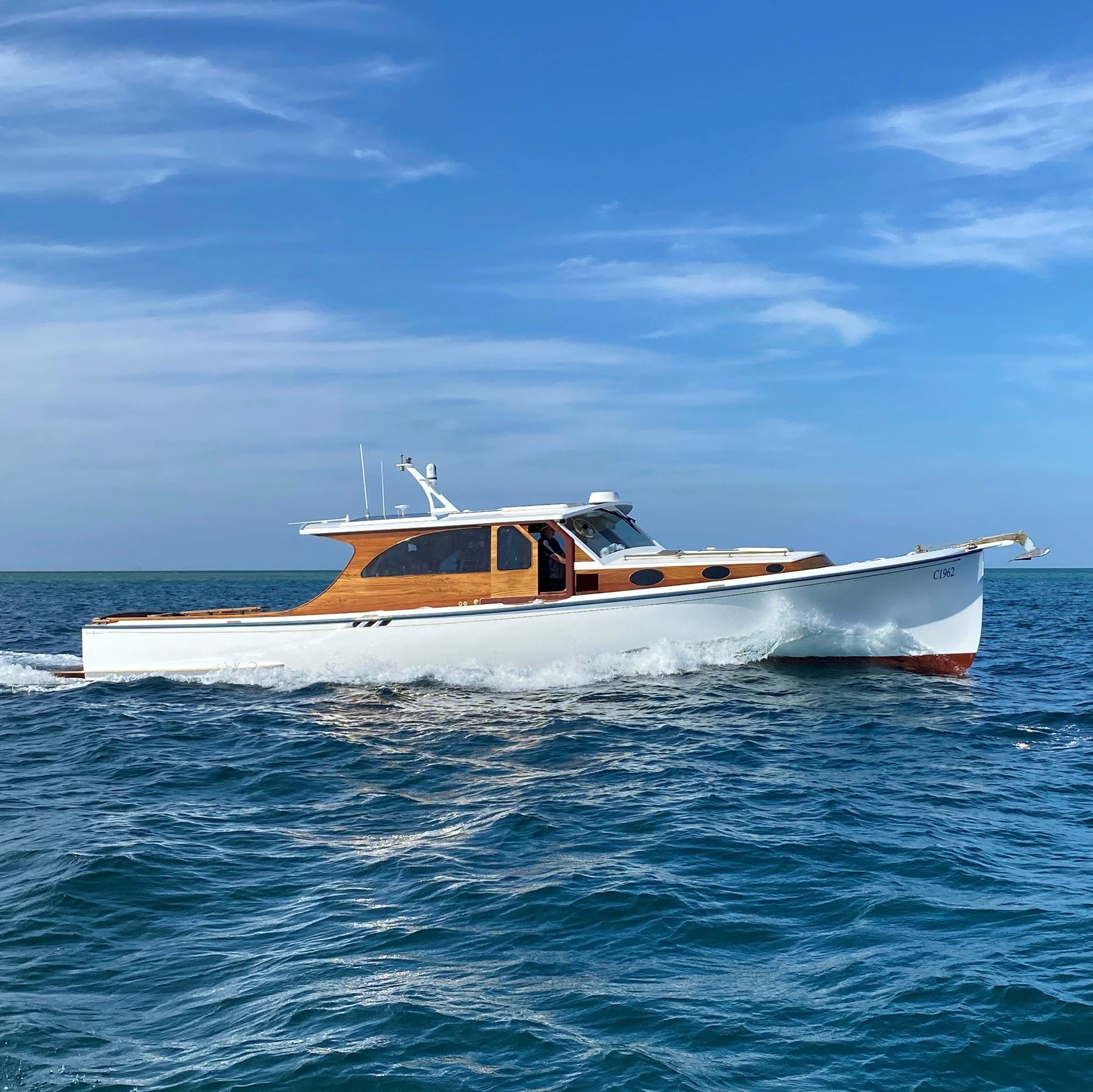 Taylor Marine Exhaust system supplied for a classic timber cruiser combining traditional craftsmanship with modern marine engineering.