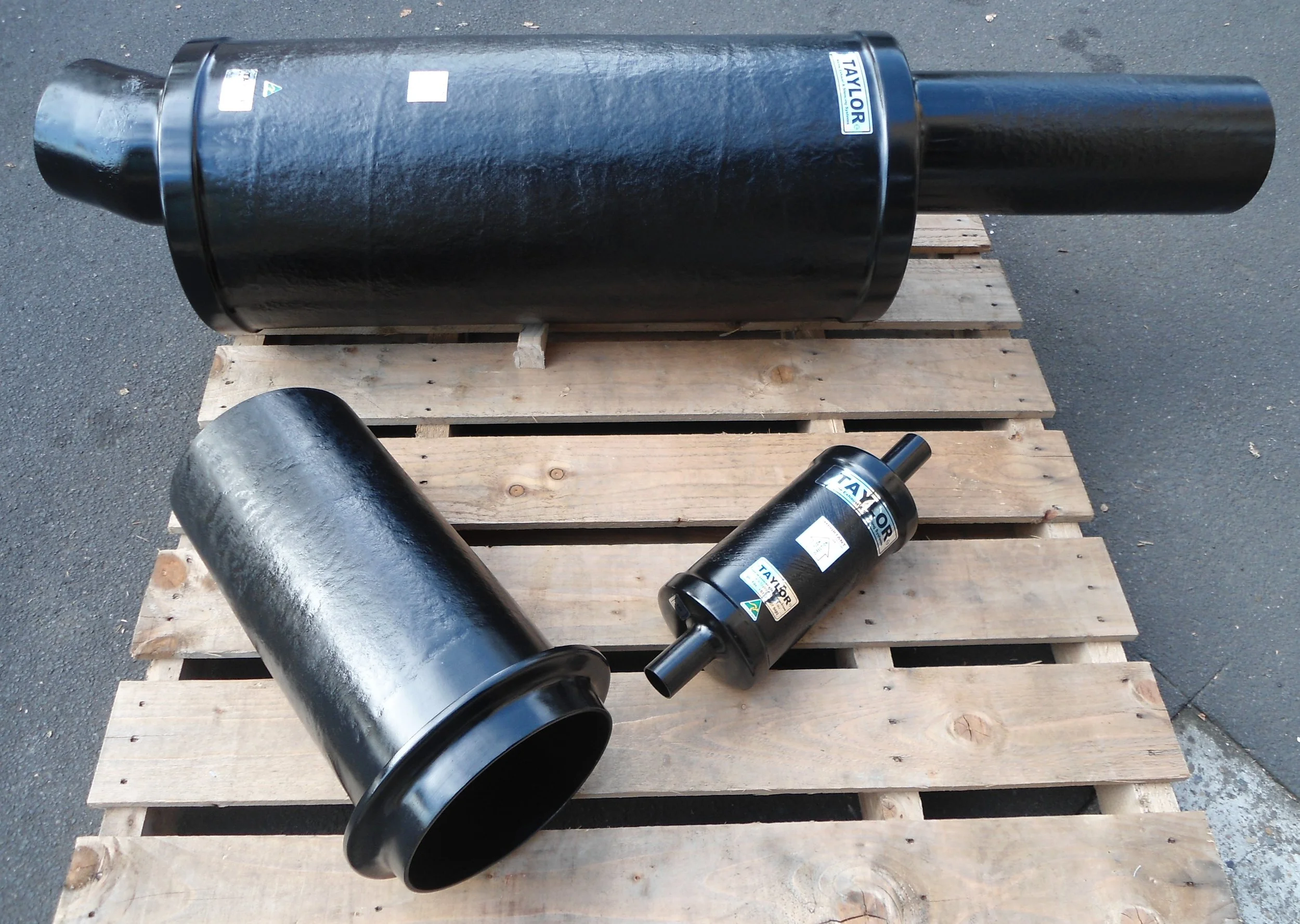 Marine inline silencers configured to suit vessel-specific exhaust requirements.