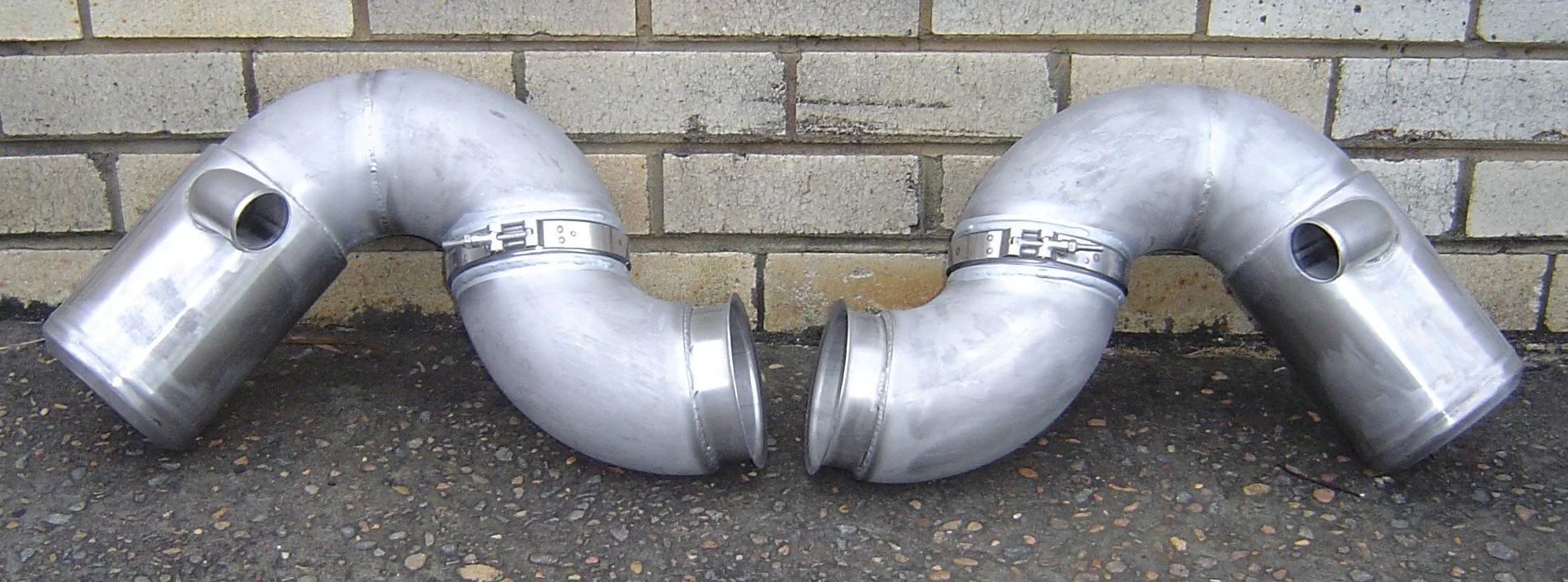 Large diameter stainless steel exhaust bends manufactured for vessel-specific requirements.