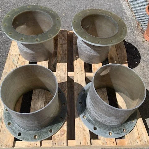 Custom vinyl ester exhaust fittings manufactured for vessel-specific exhaust configurations.