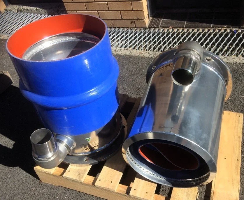 Custom stainless steel exhaust risers and silicone hose connections.
