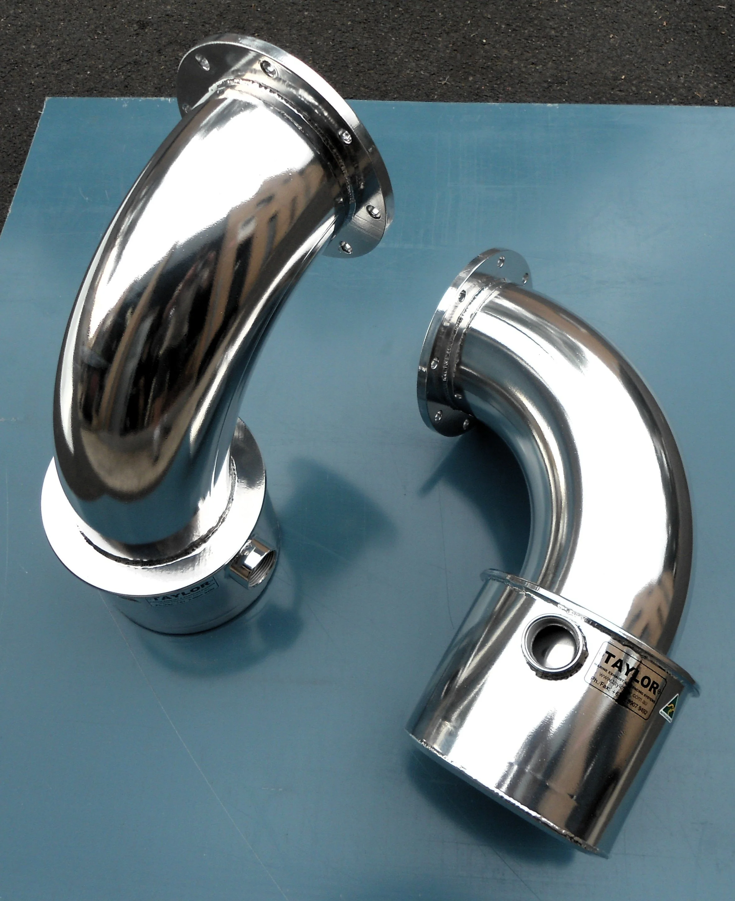 Precision fabricated stainless steel exhaust bends for marine applications.