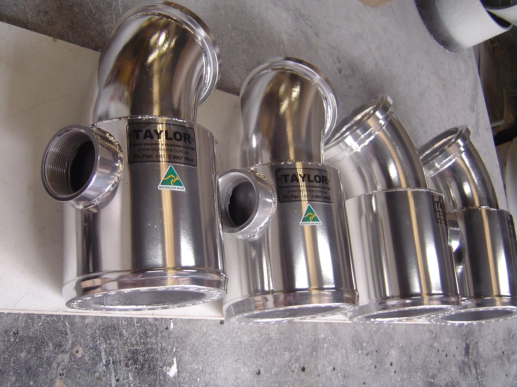 Marine stainless steel exhaust risers manufactured to suit vessel-specific requirements.