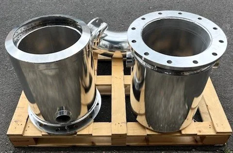 Custom stainless steel exhaust mixers engineered for vessel-specific installations.