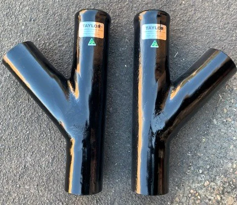 Glass-reinforced vinyl ester exhaust Y-pieces manufactured for custom exhaust layouts.