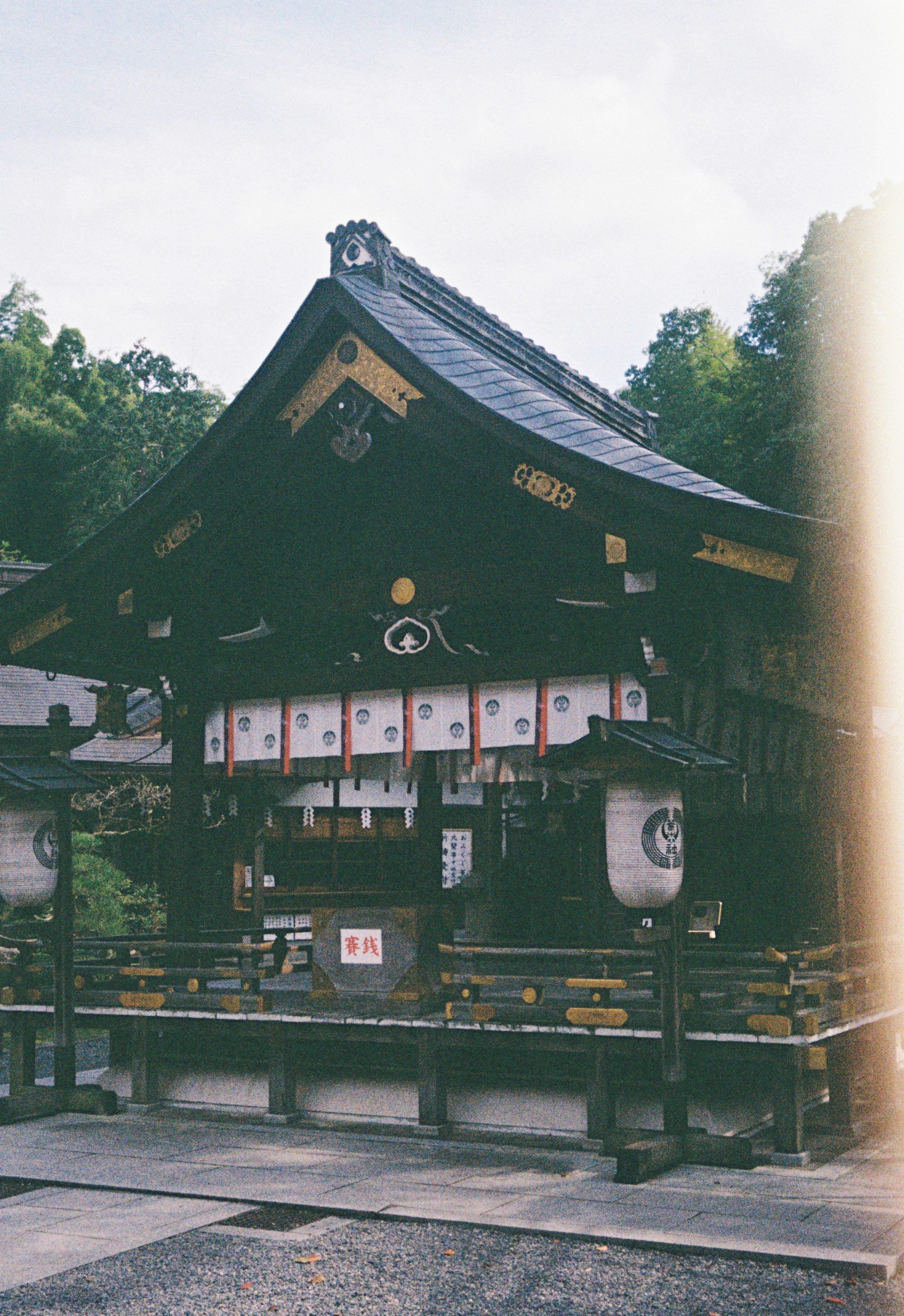 Traditional Japanese shrine architecture photographed on Olympus Pen EE-3 film camera.