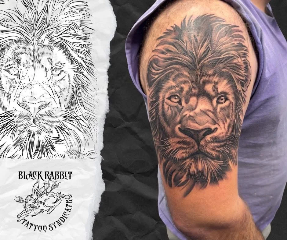 A black and gray tattoo of a lion's face on a person's upper arm, next to a stencil sketch of the same lion's face. The tattoo depicts detailed fur and facial features.