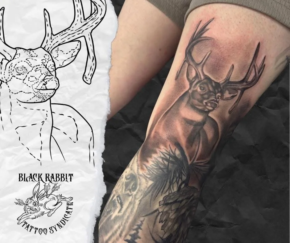 A realistic tattoo of a deer with antlers on a person's arm.