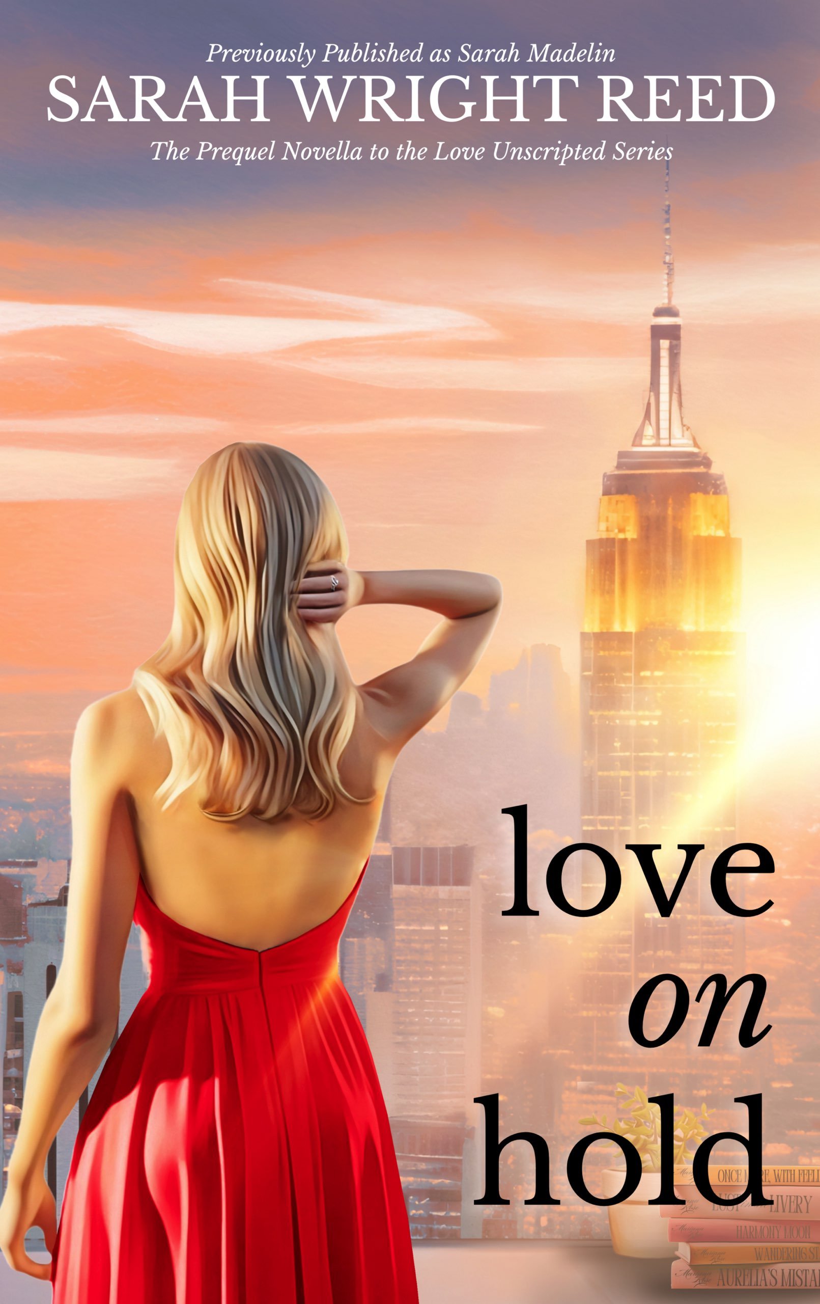 A woman in a red dress with long blond hair standing in front of a city skyline at sunset with the words "Previously Published as Sarah Madelin SARAH WRIGHT REED The Prequel Novella to the Love Unscripted Series" and "love on hold" visible.