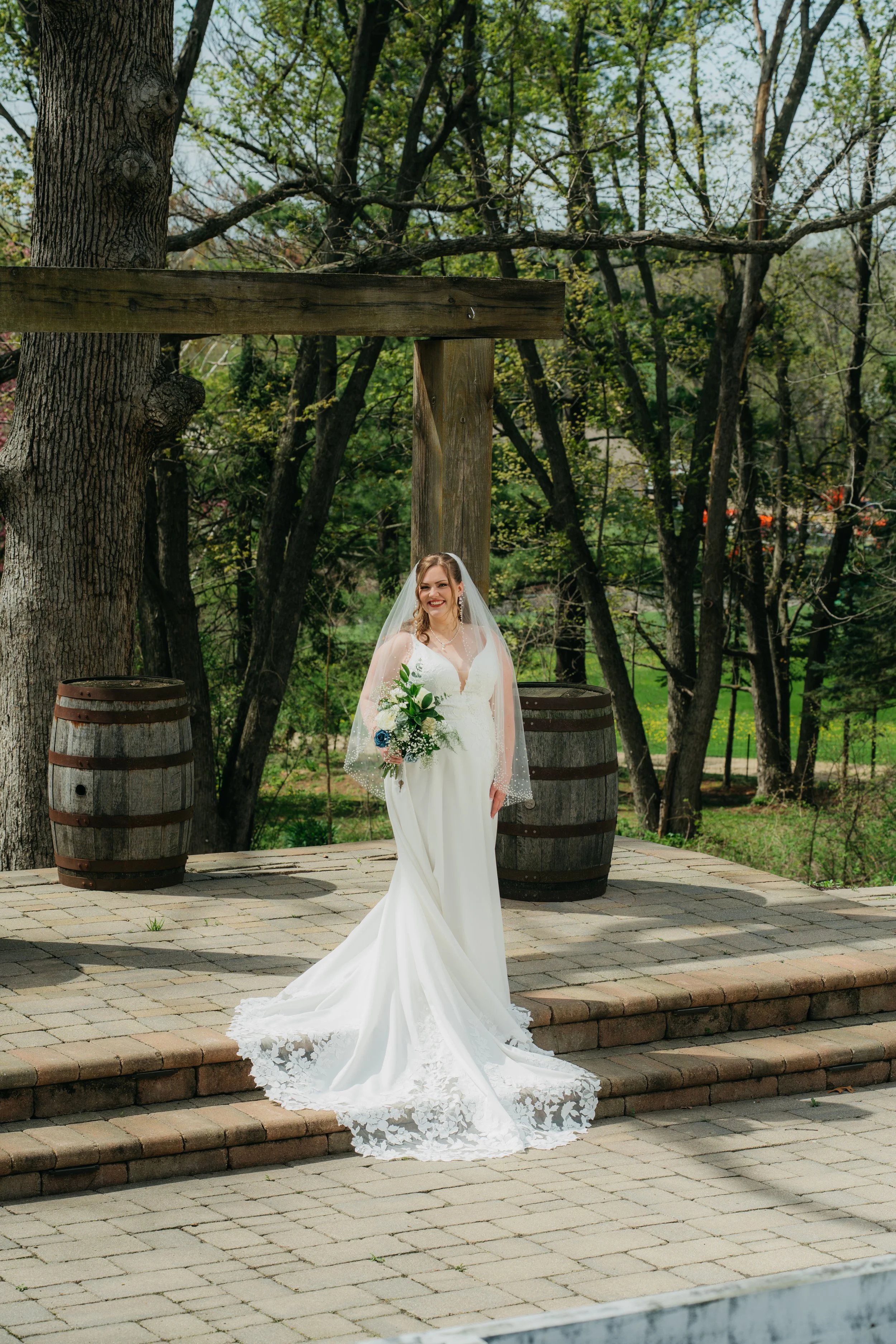 A romantic outdoor wedding portrait capturing the natural beauty, emotion, and connection between the bride and groom.