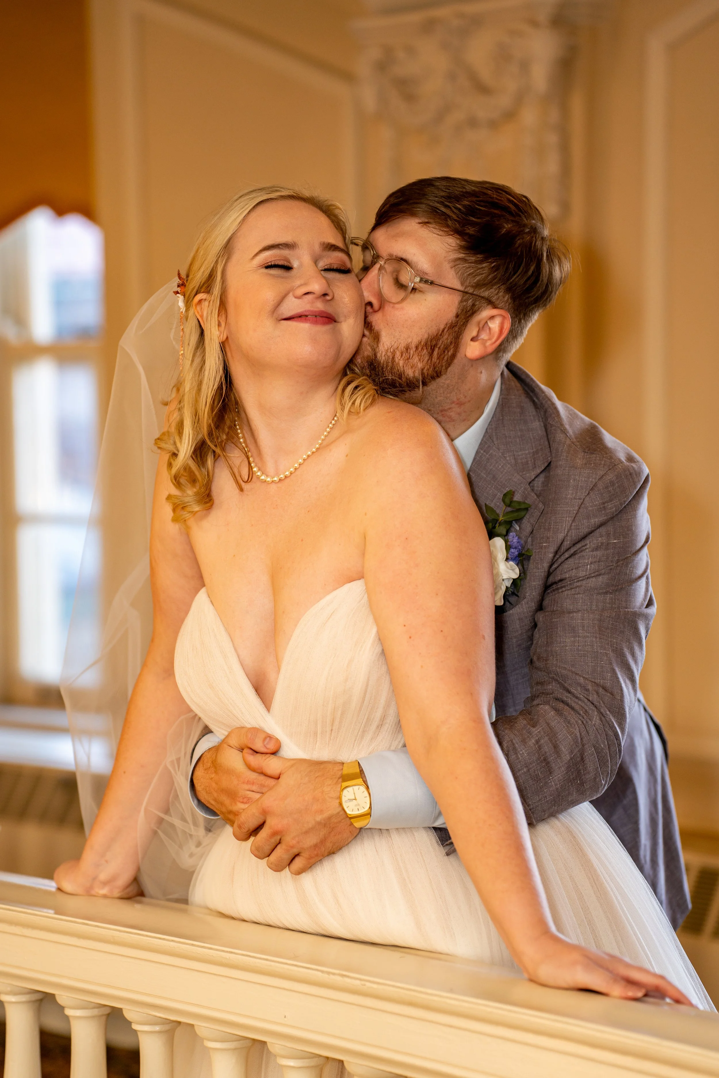 A fun and elegant wedding party image documenting the joy and personality of the wedding day.