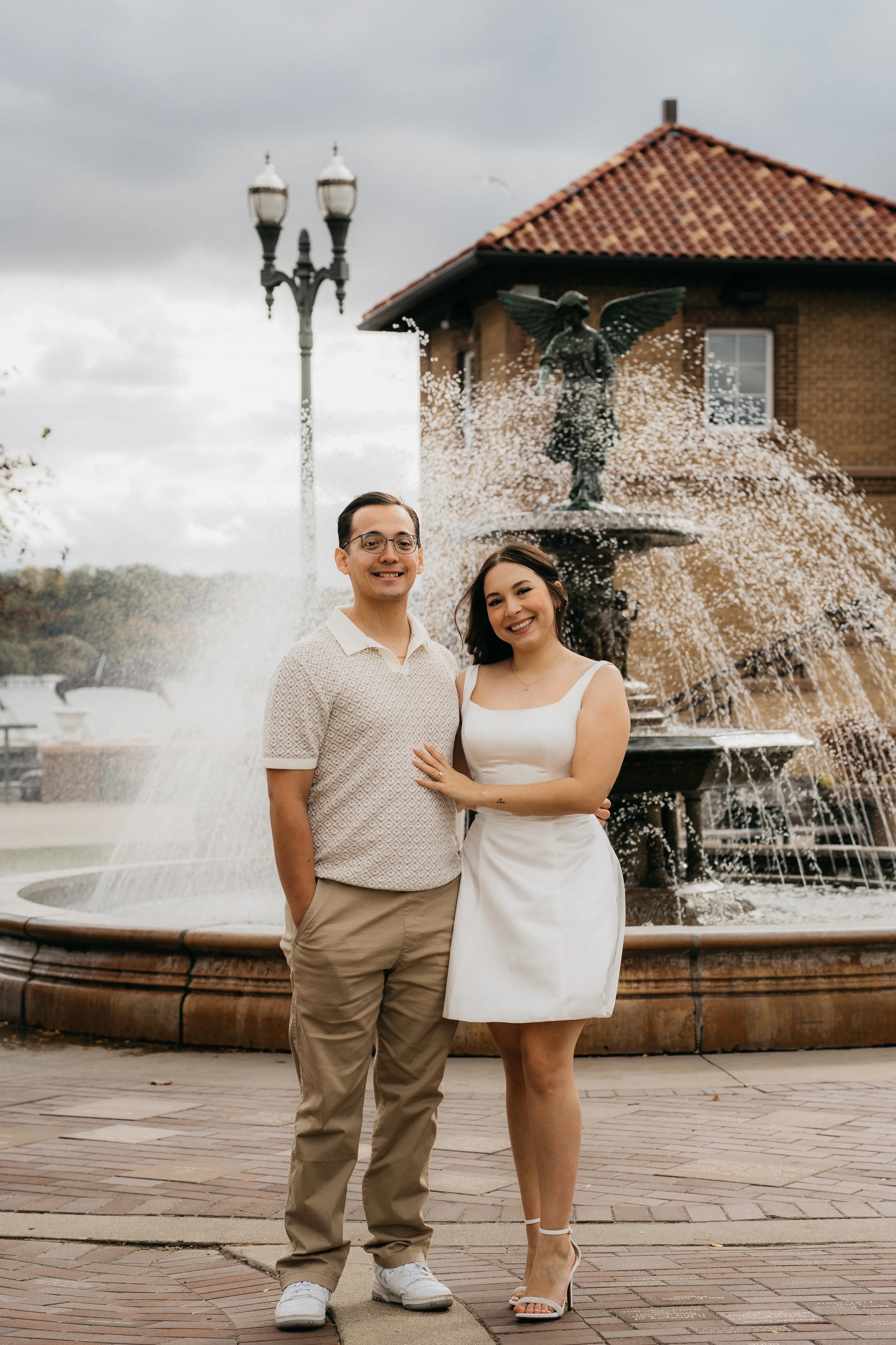 A candid couple moment from an engagement session, preserving the joy and personality of their relationship.