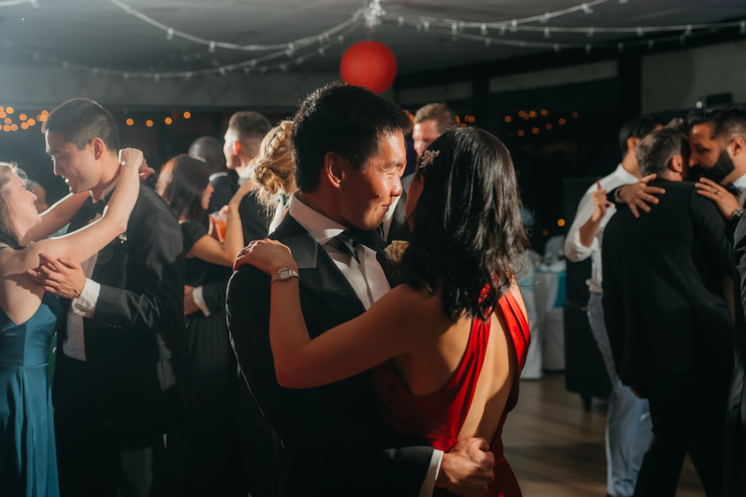 An emotional wedding day image documenting the natural connection, joy, and meaningful details that make every celebration unique.