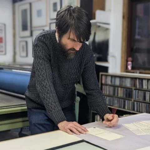 Signing copies of Basic Tables (Gazebo Books, 2023)
