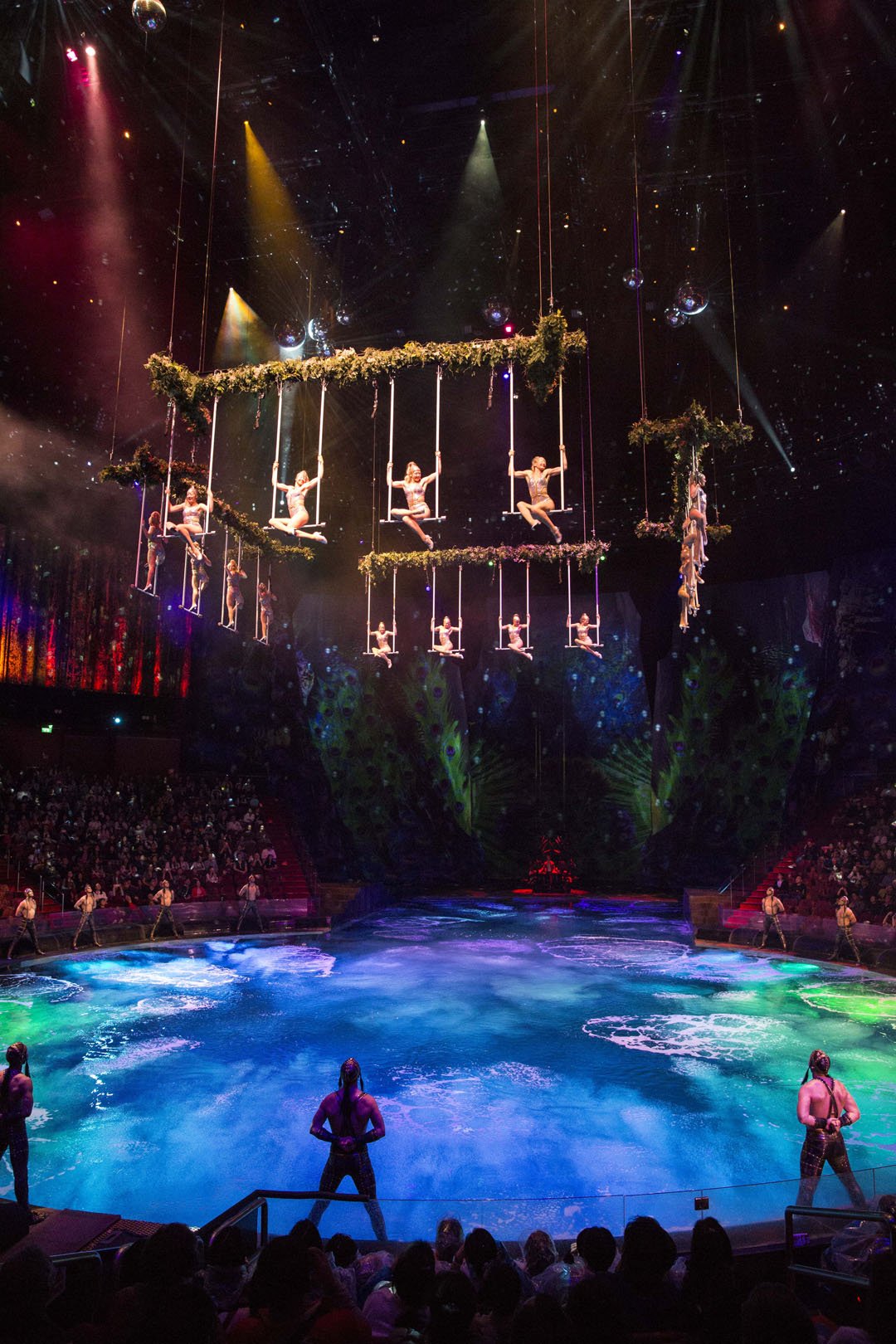 Circus performers on aerial trapeze in Franco Dragone's - The House of Dancing Water. 