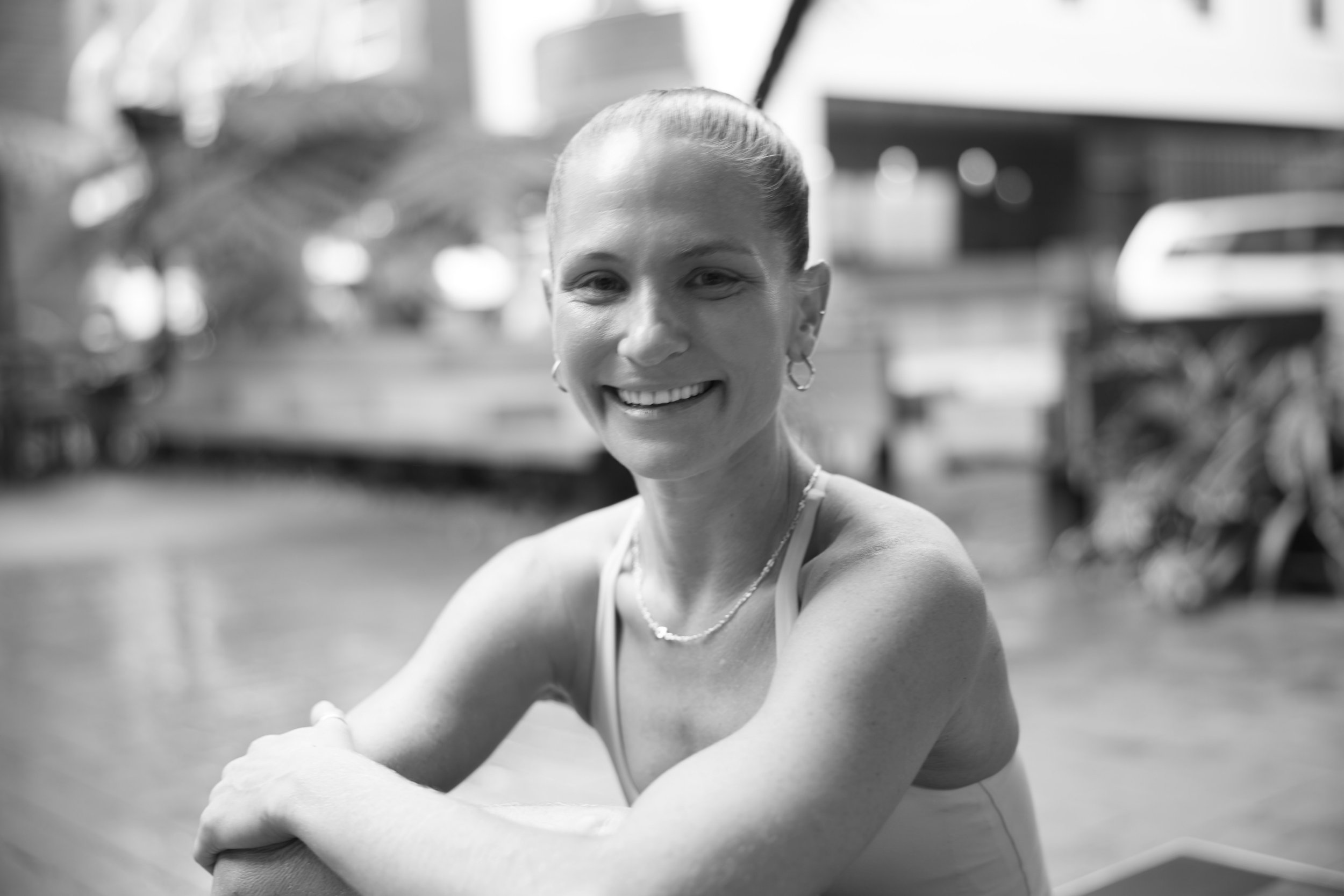 Black and White professional photo of a pilates coach. Katherine Baring-Gould 