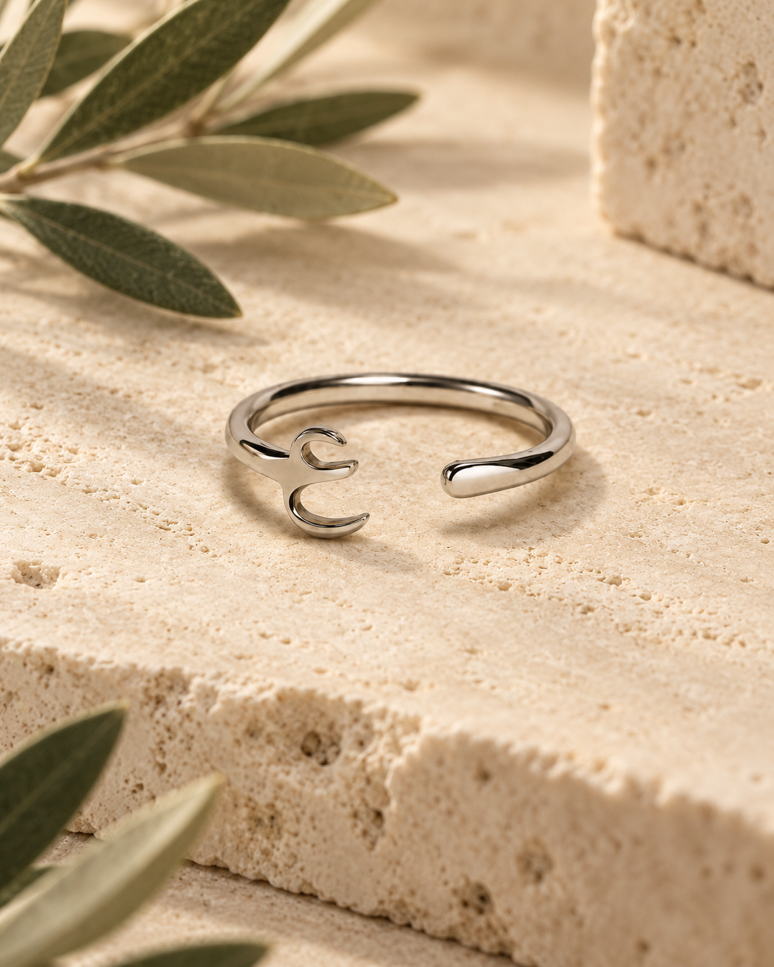 Sterling Silver Ring on Travertine.png