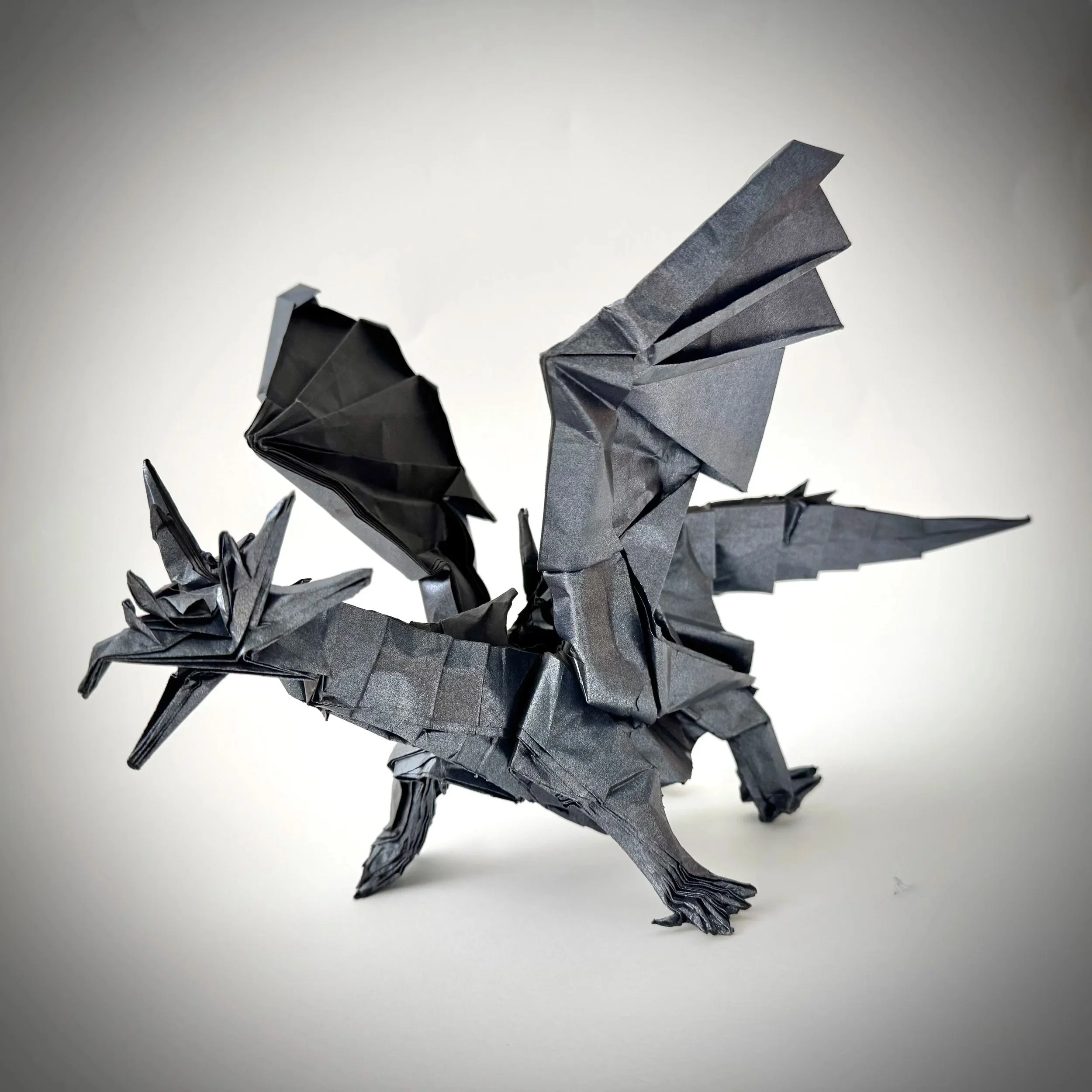 Inspired by Godzilla. Two years of failed wings and torn paper led to this moment. The metallic paper was my final choice — and it was perfect.
