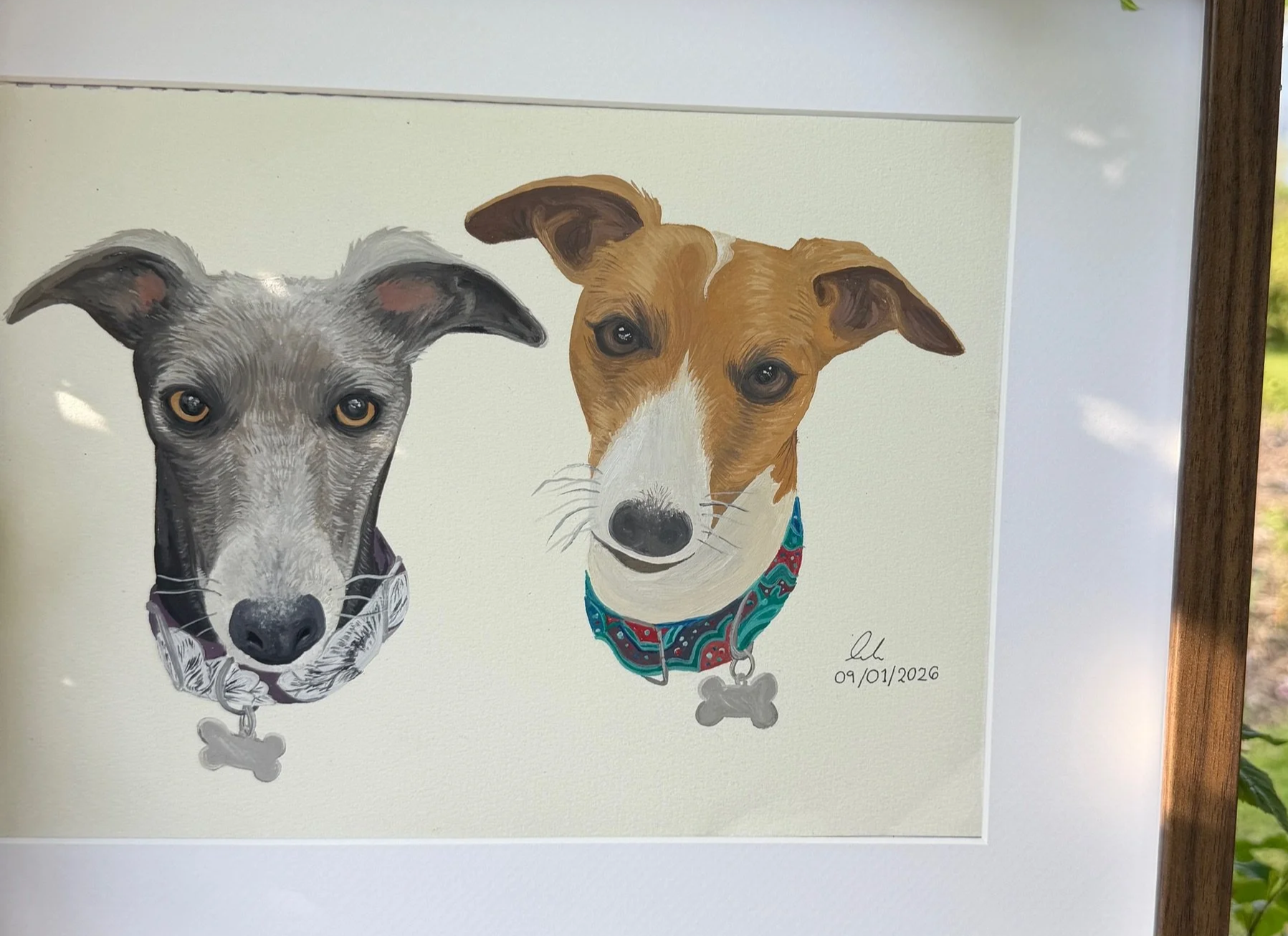 Framed example of customers pet portraits, captured in oil paint forever