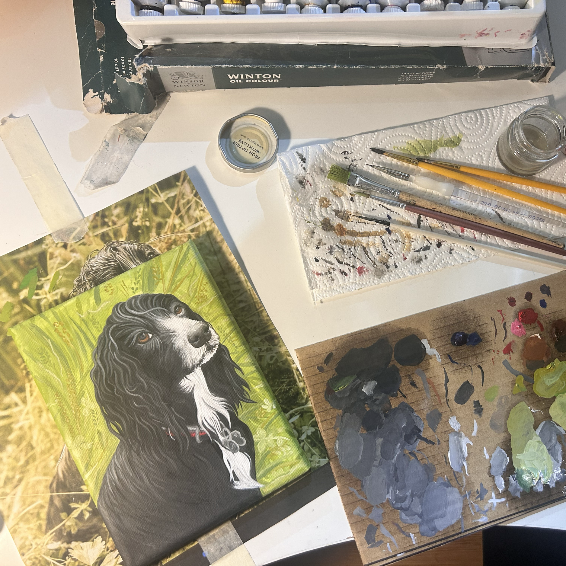 Beloved Reggie being painted on canvas