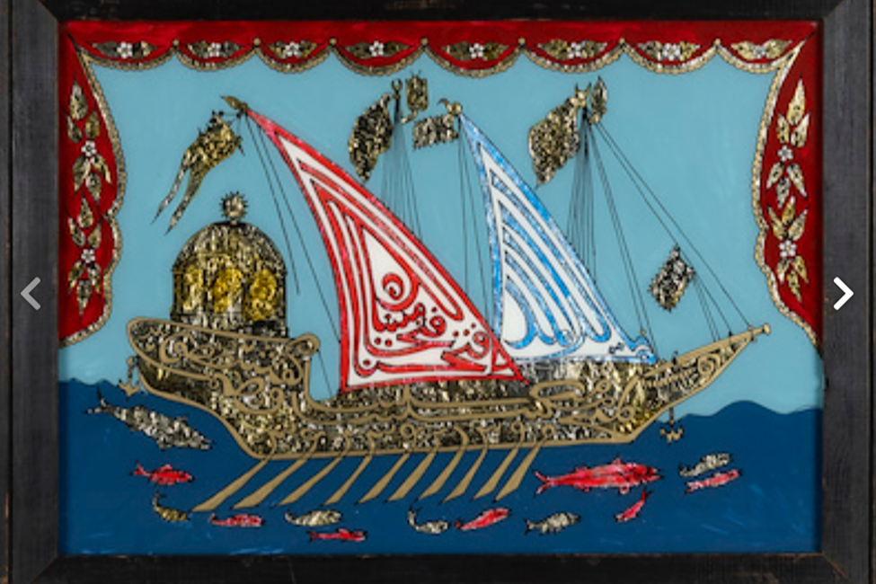 Decorative artwork of a ship with sails, dolphins, and fish, framed with ornate red and gold curtains.