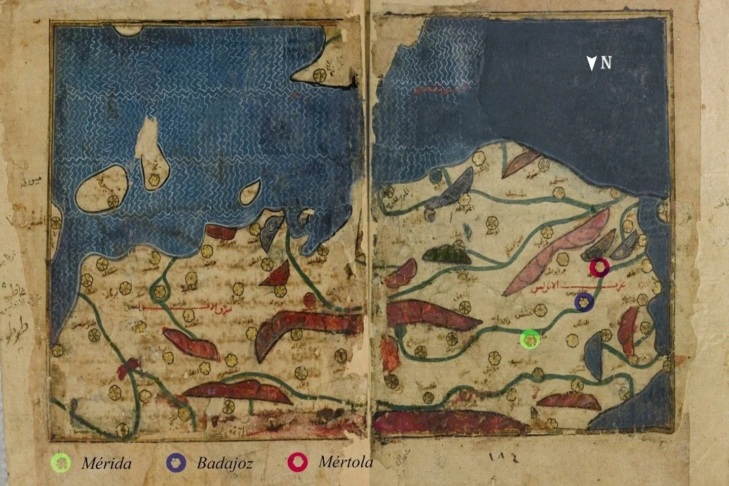 A historical map showing the regions of Mérida, Badajoz, and Mértola, with colored dots marking these locations, along with rivers, mountains, and other geographic features. The map includes Arabic script labels and a compass rose indicating north.