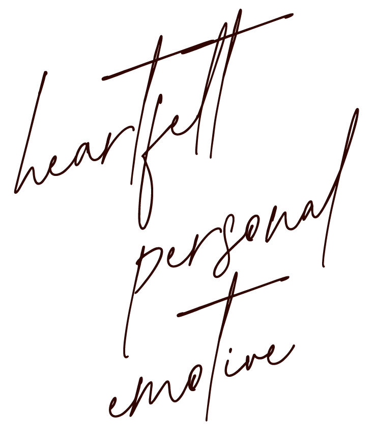 Handwritten text reading "heartfelt personal emotion" in dark red on a black background.