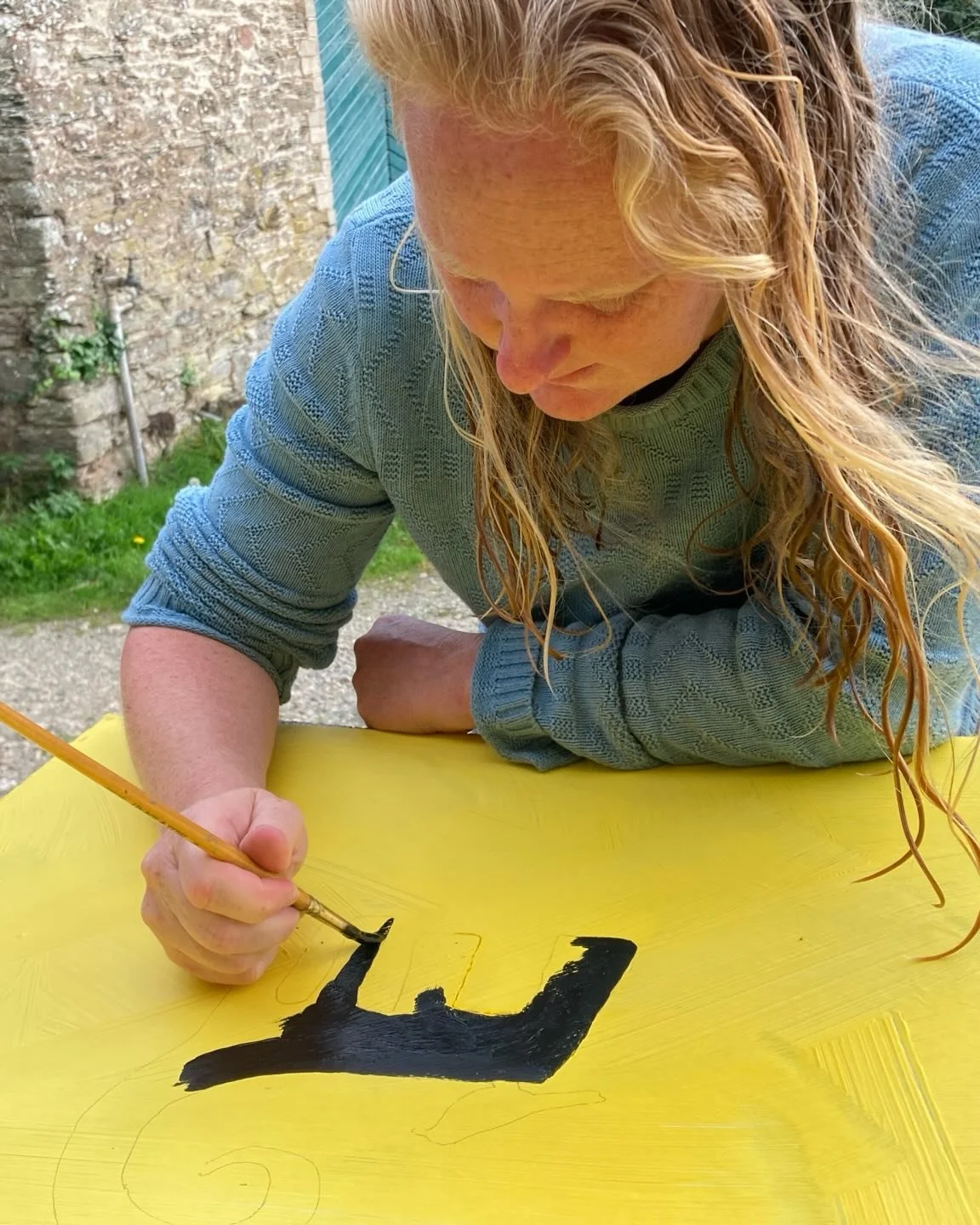 Me (Henri) trying to give Hilary @theartofyourheart  a run for her money after so many people thought she was responsible for the excellent signage at @gweekvillagestores in her post yesterday. I thought we just NEEDED a big logo sign for our first w