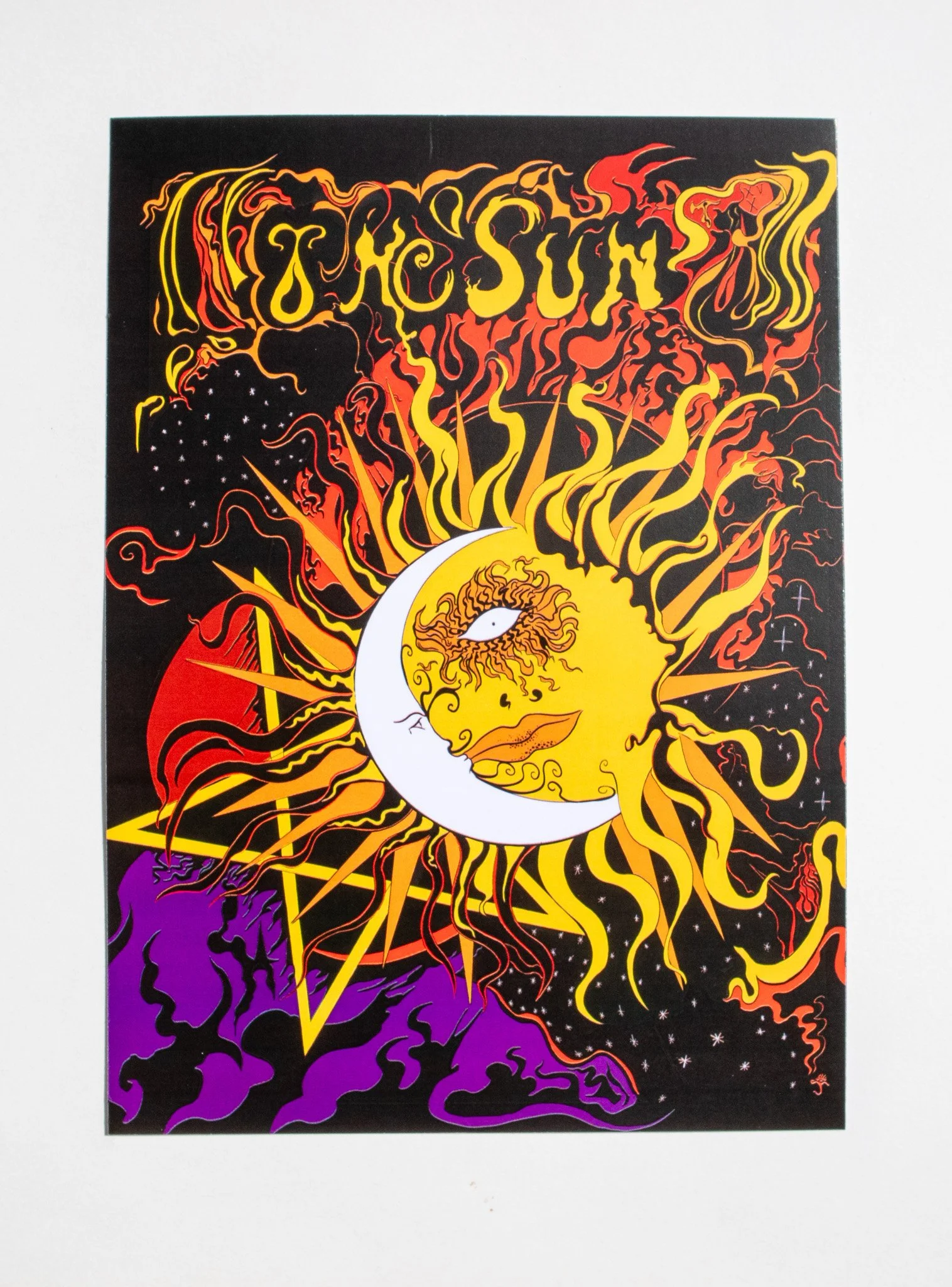 A colourful psychedelic print of the sun and the moon tarot cards - inspired by 60s poster art.