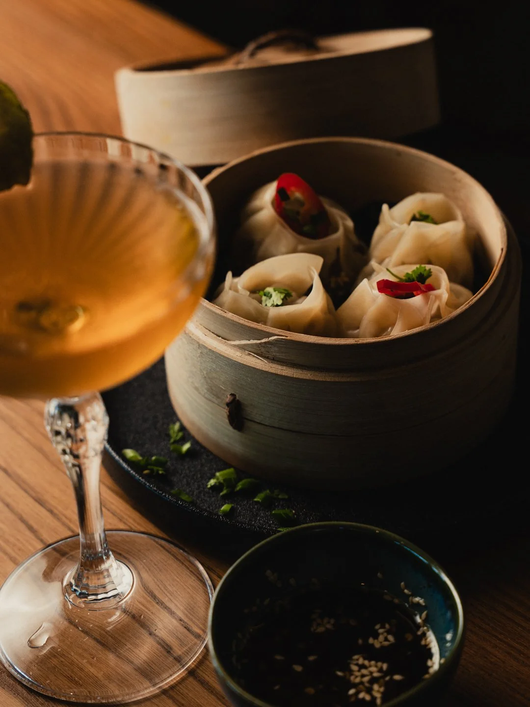 Handmade dim sum trio with dipping sauces, Pan-Asian kitchen at East 23