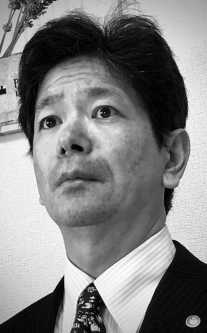 代表税理士（佐々木健）の黒白写真