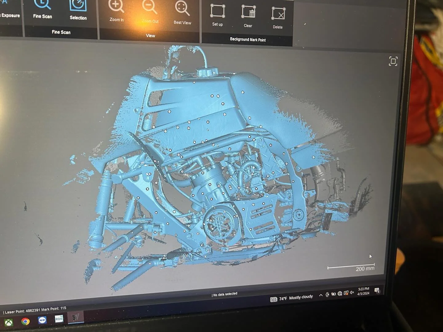 3D scan of a motorcycle frame displayed on a computer monitor.