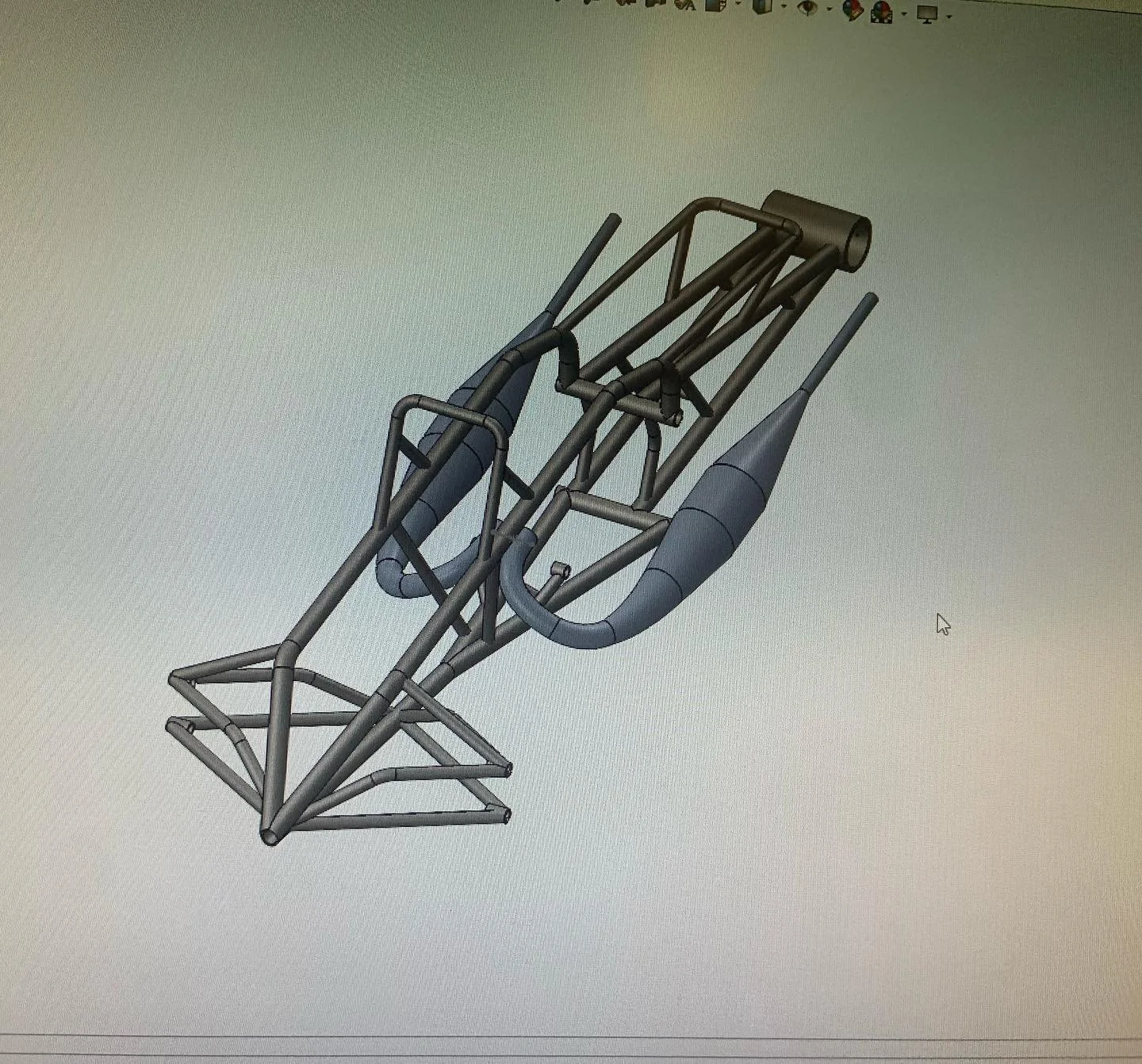 3D CAD model of a rocket engine with complex piping and structural framework.