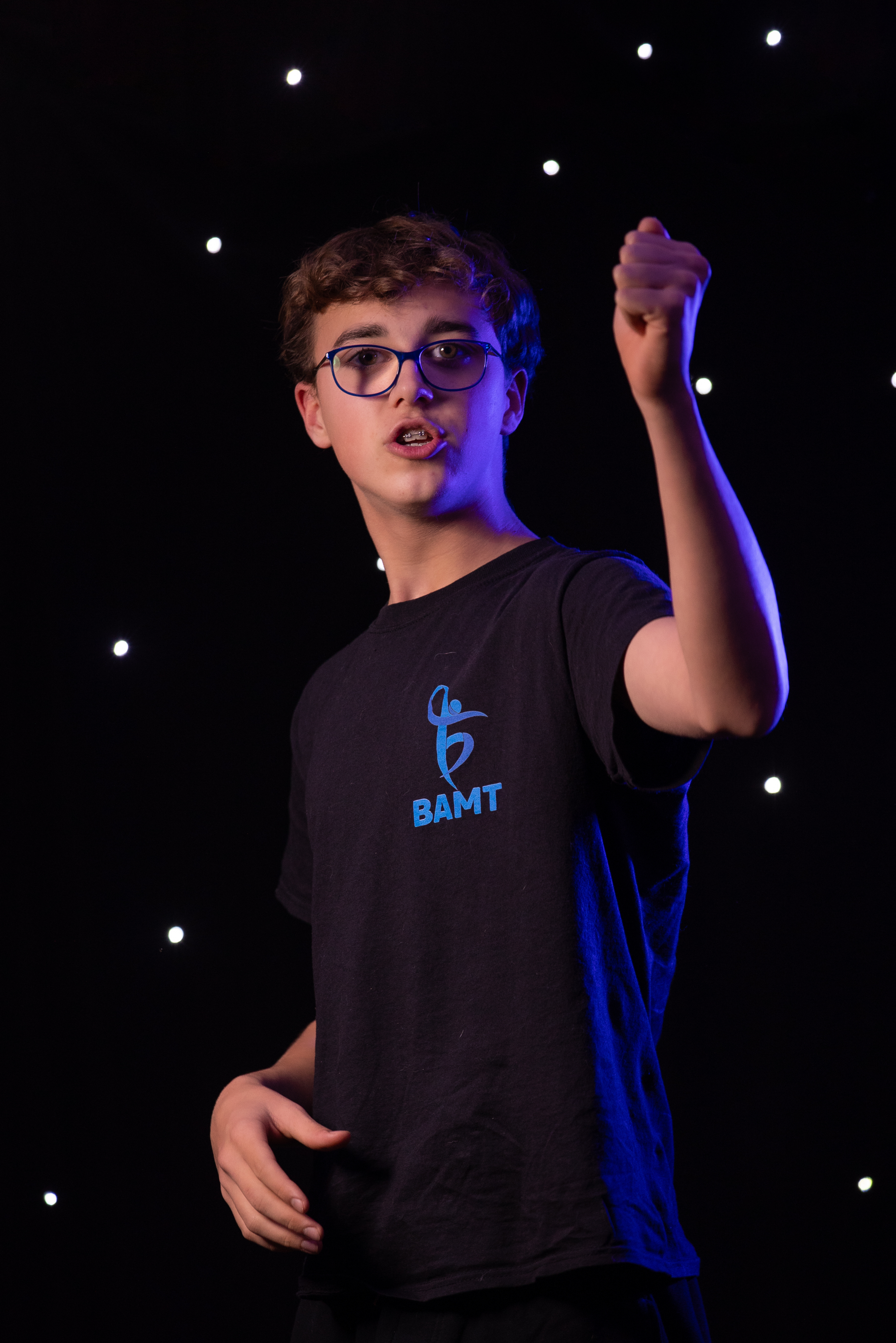 BAMT student singing and gesturing