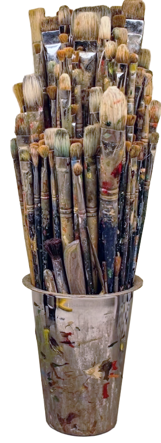 A container filled with numerous used paintbrushes of various sizes and shapes, some with dried paint on the handles and bristles.
