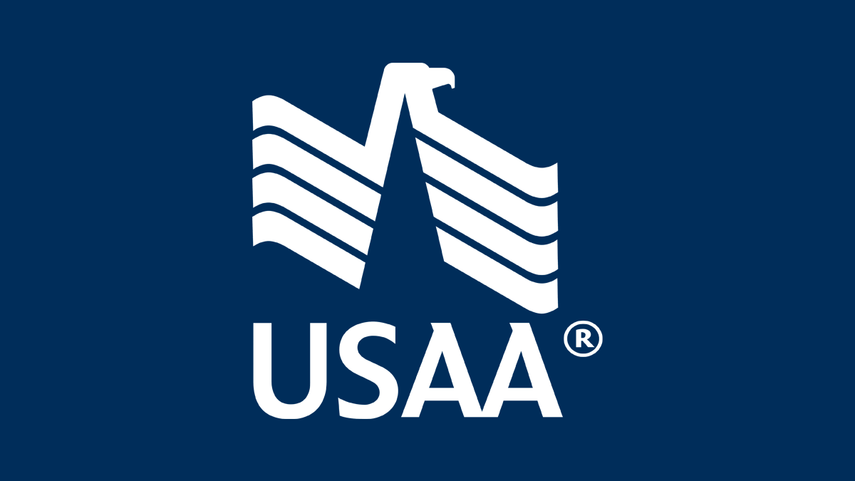 USAA logo featuring a stylized eagle head emerging from a multi-layered shield with horizontal lines, with the text 'USAA' below.