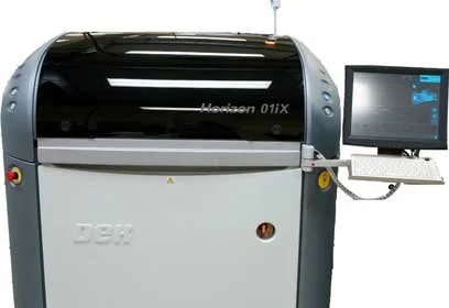 Laser engraver machine with a computer monitor attached.