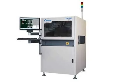 Automated industrial machine with a digital screen and warning light on top.
