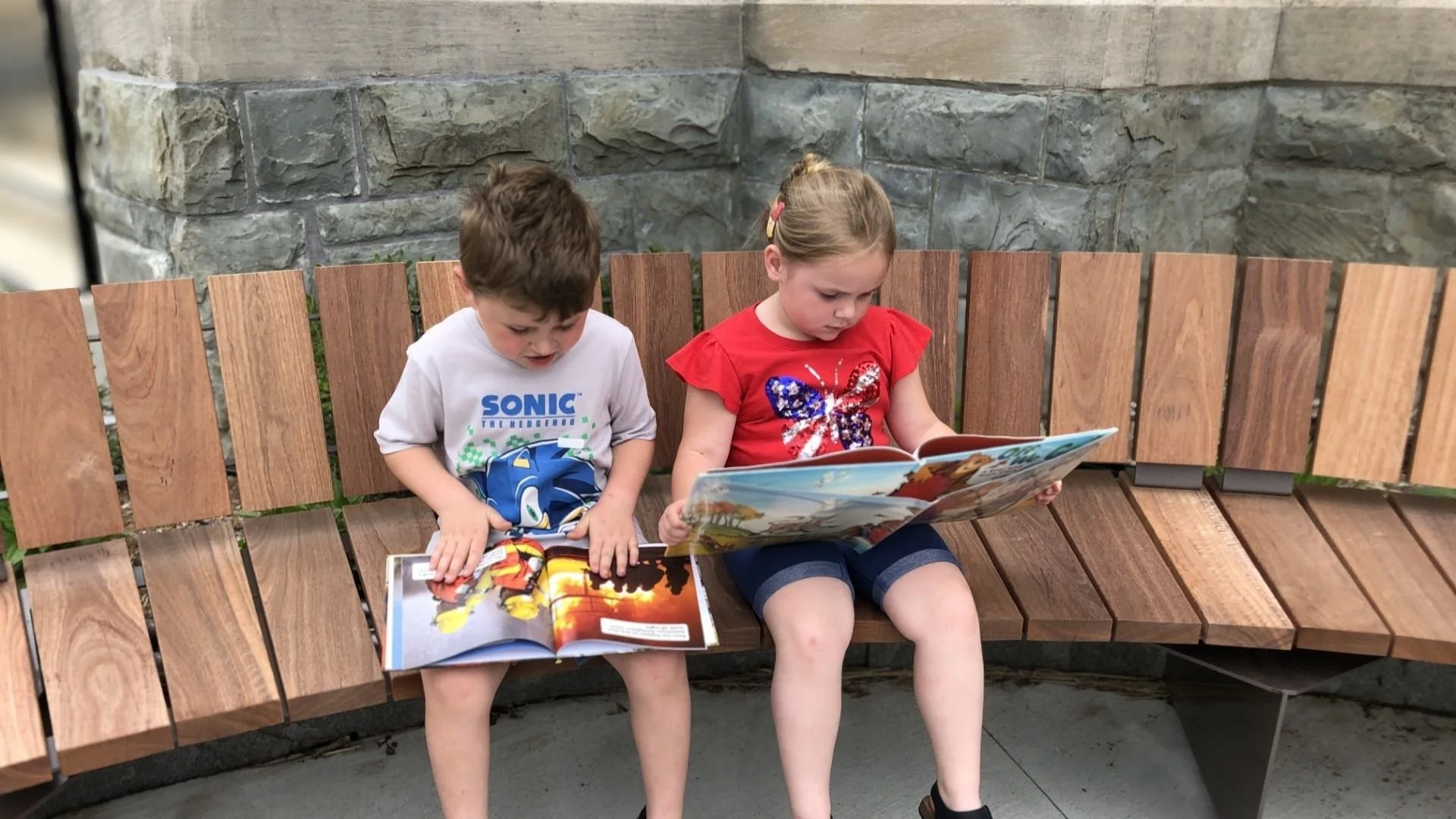 Boy and Girl Reading Outside JPL