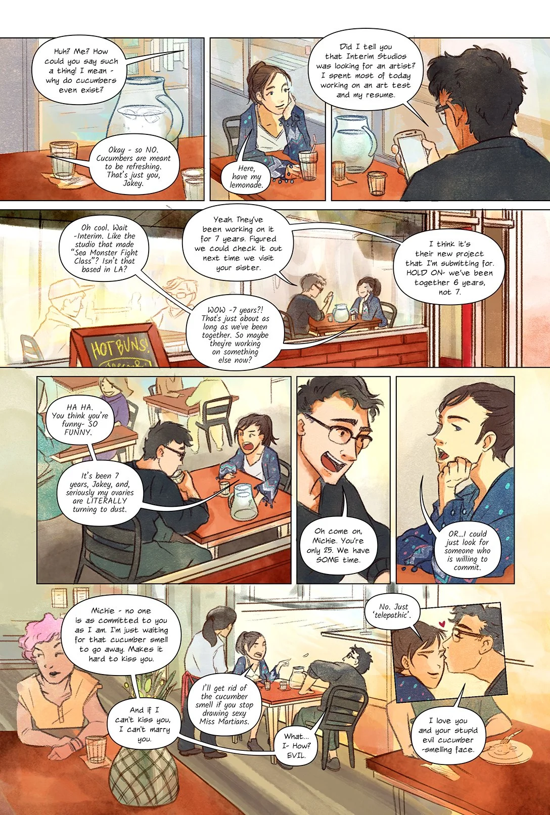 Young couple talking together over coffee in a cafe.