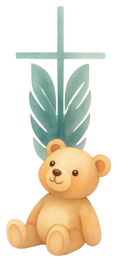 Teddy bear with a cross and green leaves behind it.