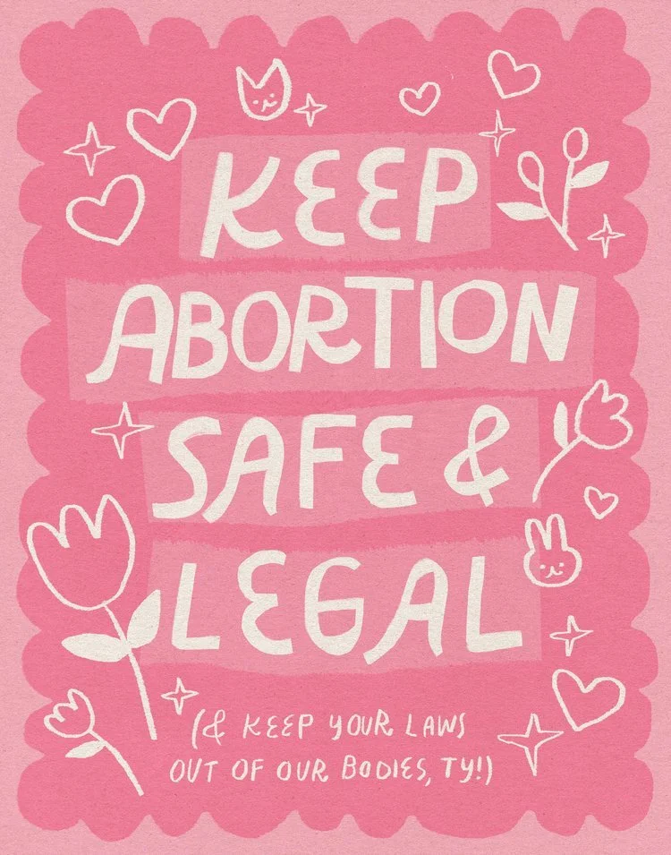 Pink poster with white handwritten text that reads, "Keep Abortion Safe & Legal," surrounded by doodles of hearts, flowers, stars, a bunny, a cat face, and a small message at the bottom that says, "(& keep your laws out of our bodies, ty!)."