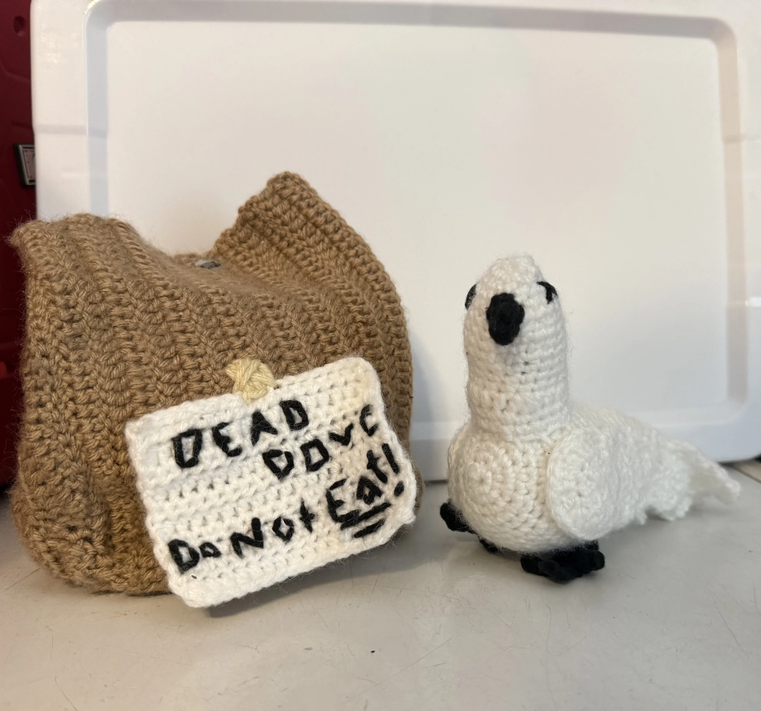 dead dove crocheted bag and standing dove