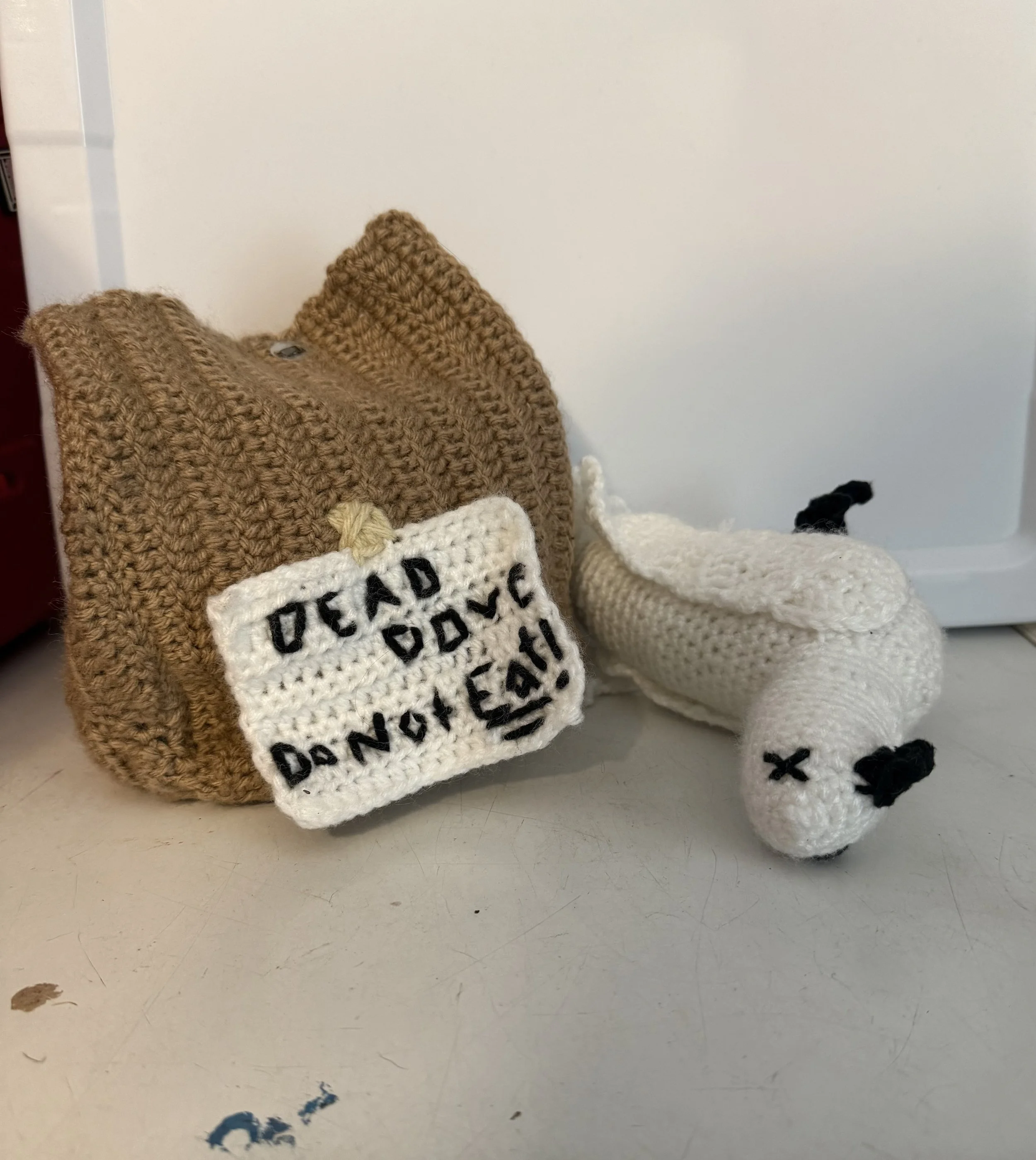 dead dove do not eat bag with dead dove crocheted