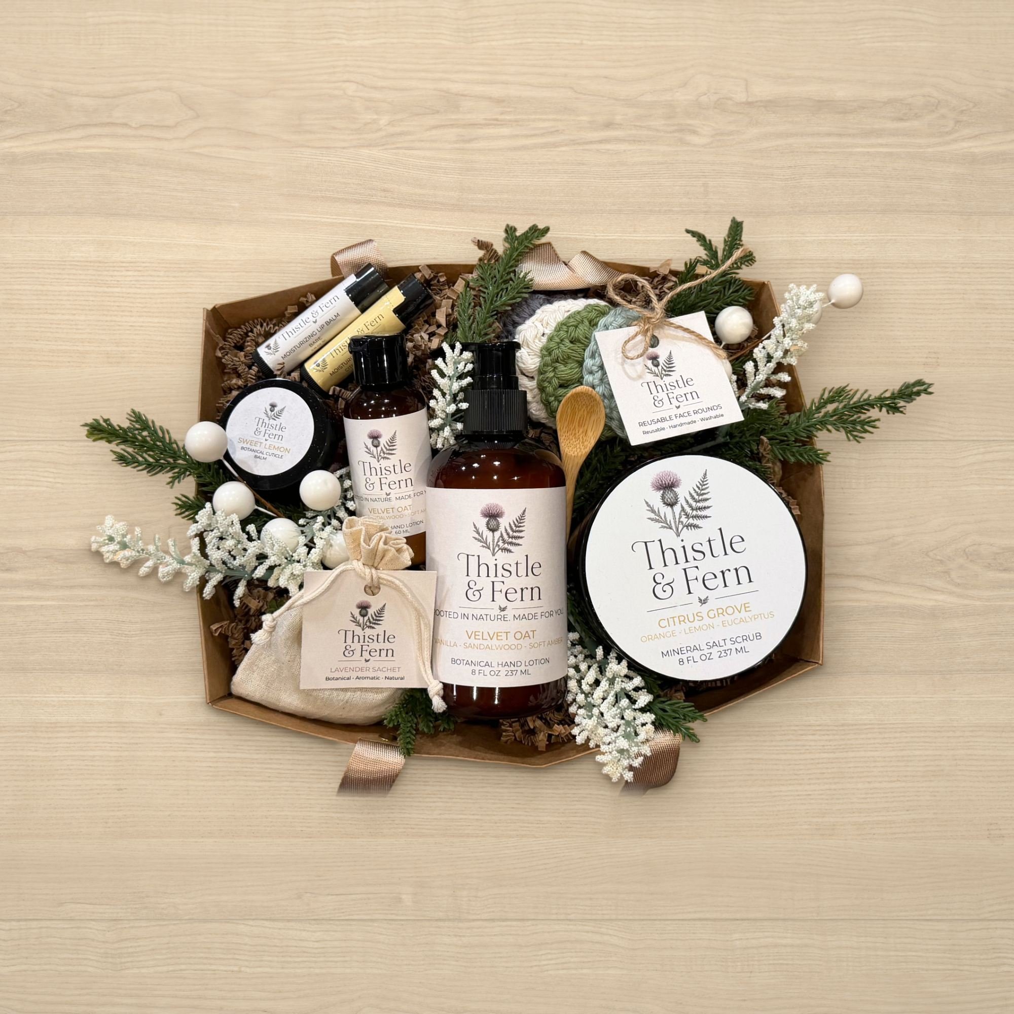 Thistle & Fern Deluxe Spa Gift Basket with two Botanical Hand Lotions, Mineral Salt Scrub with wood spoon, lip balms, cuticle balm, sachet and Reusable Face Rounds